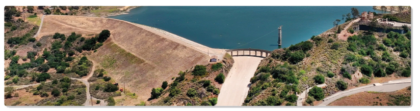 Aerial view of the Santiago Creek Dam, spillway and outlet tower at Irvine Lake